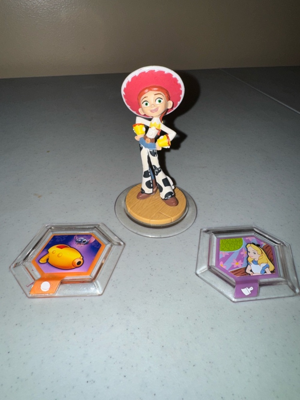 Disney infinity figurine Jessie 1.0 Stitch and Alice blaster power pack